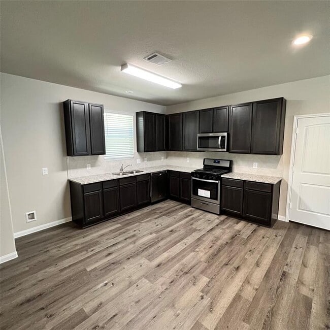 25396 Grotto Falls Ln in Porter, TX - Building Photo - Building Photo