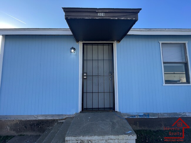 property at 309 SW 19th St