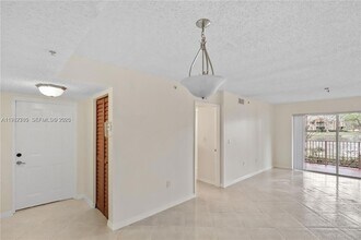 3844 Lyons Rd, Unit 112-4 in Coconut Creek, FL - Building Photo - Building Photo
