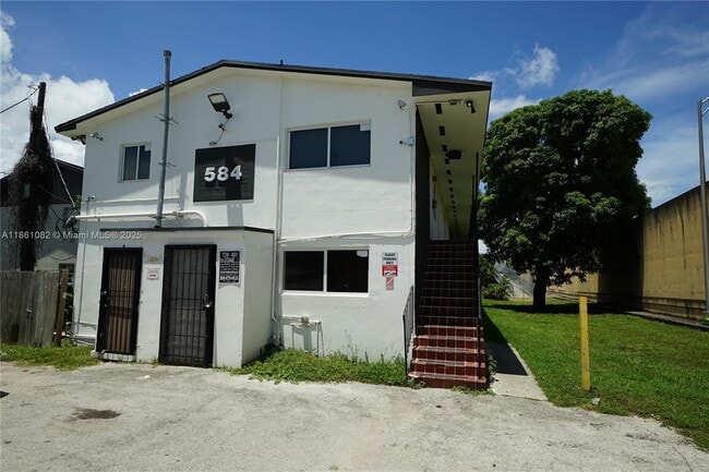 property at 584 NW 65th St