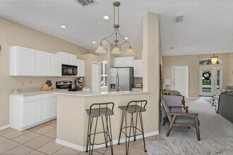 3851 Beacon Ridge Way in Clermont, FL - Building Photo - Building Photo