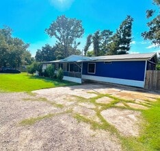 491 E Sherwood Dr in Livingston, TX - Building Photo - Building Photo