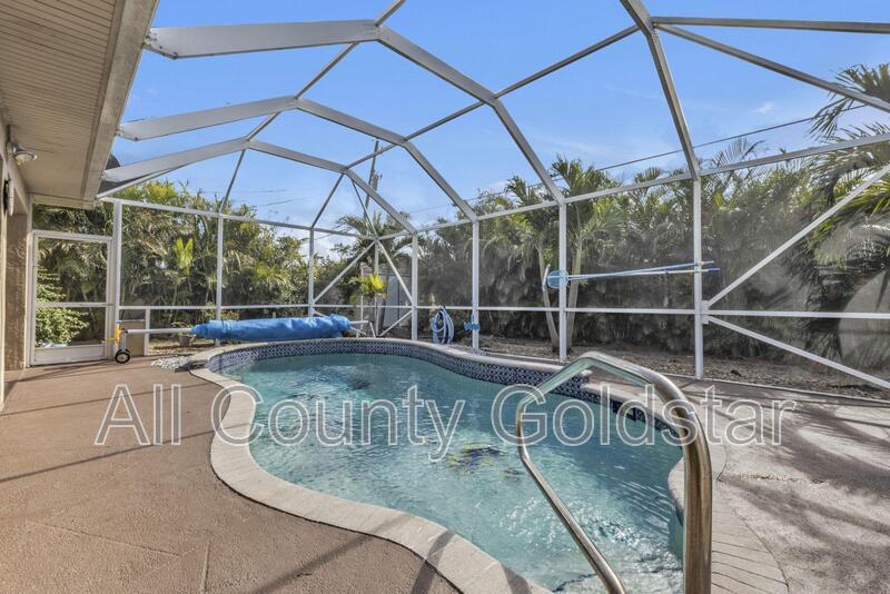 23309 Hartley Ave in Port Charlotte, FL - Building Photo