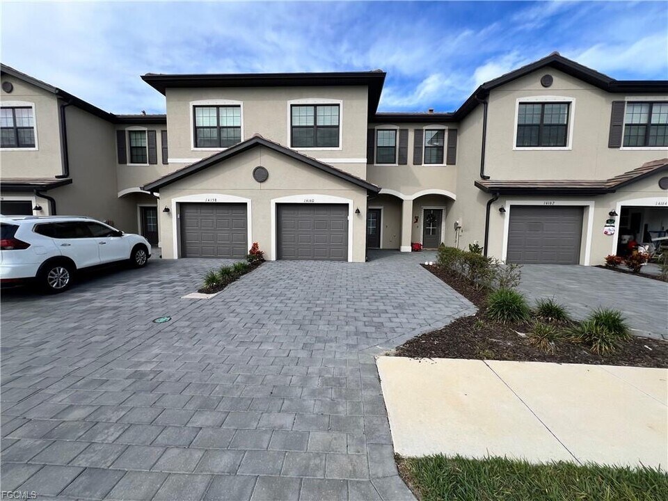 14160 Pine Lodge Ln in Miromar Lakes, FL - Building Photo