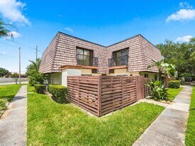 15446 E Pond Woods Dr in Lake Magdalene, FL - Building Photo