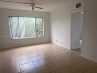 3231 NW 103rd Ter, Unit 208-C in Coral Springs, FL - Building Photo - Building Photo