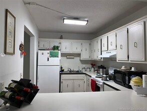1750 W 46th St-Unit -239 in Hialeah, FL - Building Photo - Building Photo