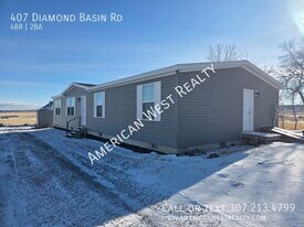 407 Diamond Basin Rd in Cody, WY - Building Photo