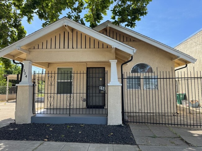 property at 114 E 4th St