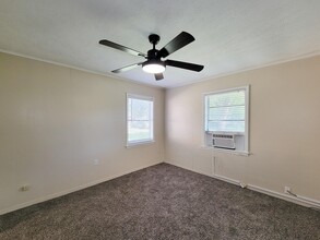 1107 Milam St in Liberty, TX - Building Photo - Building Photo