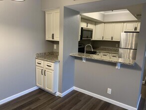 1548 SE Royal Green Cir, Unit 105 in Port St. Lucie, FL - Building Photo - Building Photo