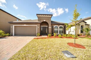 1033 Musgrass Cir in West Melbourne, FL - Building Photo