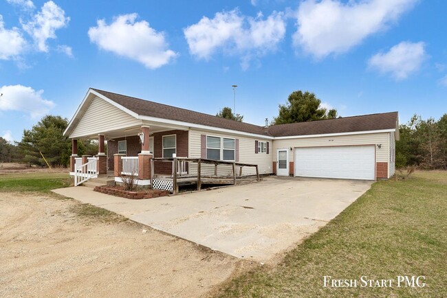 6528 Whitefish Rd in Howard City, MI - Foto de edificio - Building Photo