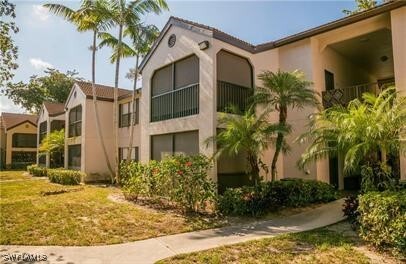 2214 Arbour Walk Cir in Naples, FL - Foto de edificio