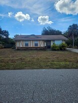1225 Armsdale Ave in Port Charlotte, FL - Building Photo