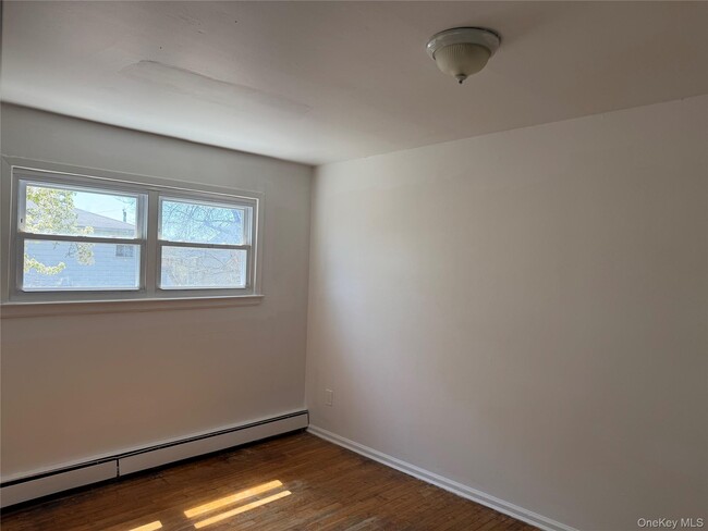 property at 69-35 De Costa Ave