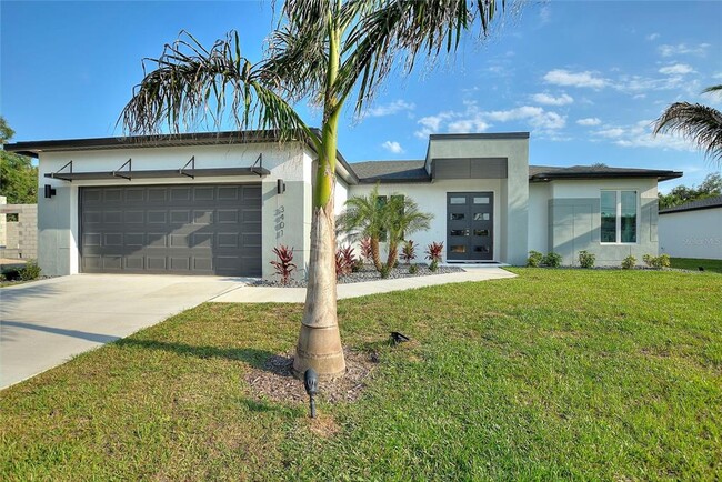24389 SW Kingsway Cir in Lake Suzy, FL - Foto de edificio - Building Photo