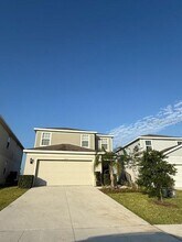 7457 Catania Lp in Clermont, FL - Building Photo - Building Photo