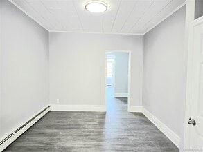 56-46 Myrtle Ave in Queens, NY - Building Photo - Building Photo