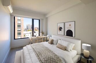 215 E 124th St-Unit -5C in New York, NY - Building Photo - Building Photo