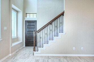 8739 Tubelo Mill Dr in Sienna, TX - Foto de edificio - Building Photo