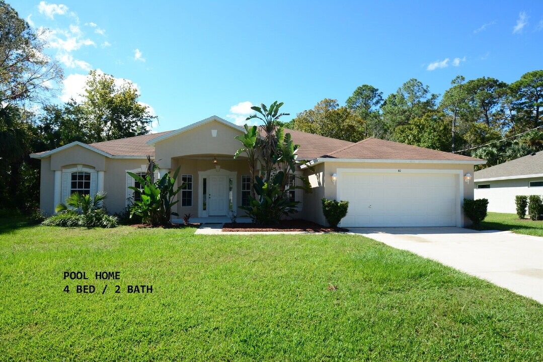 40 Sloganeer Trail in Palm Coast, FL - Building Photo