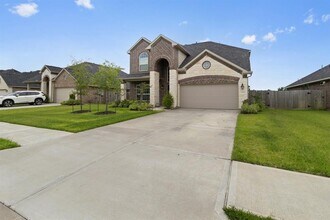 12114 Champion's Frst Dr in Mont Belvieu, TX - Building Photo - Building Photo