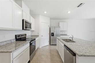 1433 Princess Tree Ct in Haines City, FL - Foto de edificio - Building Photo