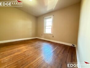 70 Beechcroft St, Unit 1 in Boston, MA - Foto de edificio - Building Photo