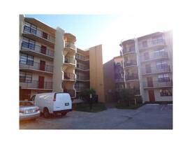 3500 Blue Lake Dr, Unit 203 in Pompano Beach, FL - Building Photo