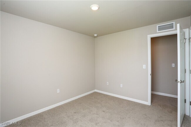 15488 Wildflower Cir in Naples, FL - Foto de edificio - Building Photo