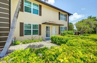 731 W Elkcam Cir in Marco Island, FL - Building Photo - Building Photo