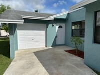 144 Fleming Ave in Greenacres, FL - Building Photo - Building Photo