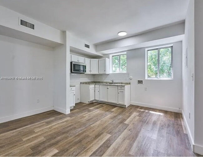 property at 6211 NW 7th Ave