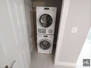 West 52nd Street, Unit 1A in New York, NY - Building Photo - Building Photo