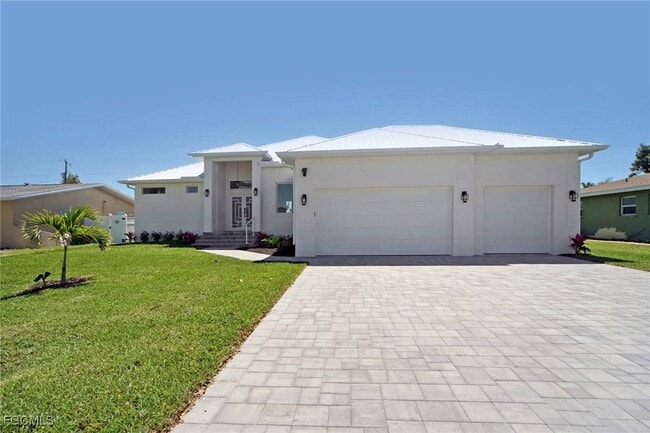 1426 SE 43rd Terrace in Cape Coral, FL - Building Photo - Building Photo