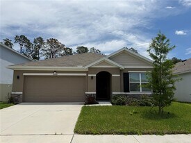 10888 Quail Grv Wy in San Antonio, FL - Building Photo
