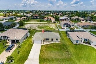 433 NW 38th Pl in Cape Coral, FL - Building Photo - Building Photo