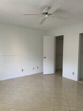 8721 Wiles Rd, Unit 107 in Coral Springs, FL - Building Photo - Building Photo