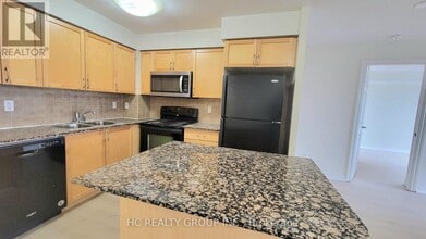 310 Burnhamthorpe Rd W in Mississauga, ON - Building Photo - Building Photo