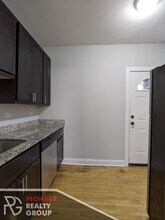 4032 N Ashland Ave, Unit 4040-1E in Chicago, IL - Building Photo - Building Photo