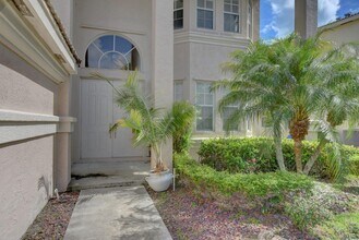 7553 Greenville Cir in Greenacres, FL - Building Photo - Building Photo