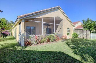 1592 Carriage Brooke Dr in Wellington, FL - Building Photo - Building Photo