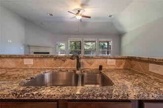 7 Whispering Thicket Pl in Tomball, TX - Building Photo - Building Photo