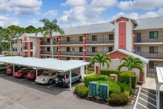 Village on Courtside Lake in Estero, FL - Building Photo - Building Photo