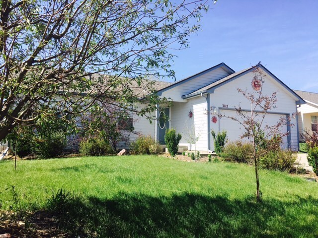 3112 Mariners Landing Dr in Evans, CO - Building Photo