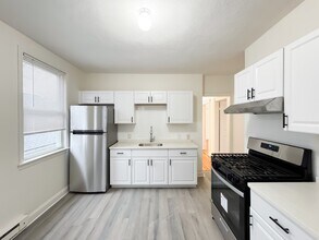 620 River St, Unit Top in Boston, MA - Foto de edificio - Building Photo