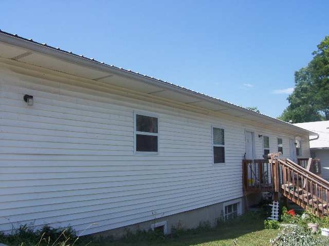 Coach House Apartments in Warsaw, MO - Building Photo - Building Photo