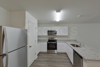20254 Lorenzo Ave in Port Charlotte, FL - Building Photo - Building Photo