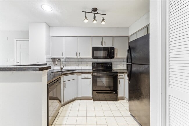 property at 1710 W T C Jester Blvd